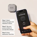 Hand holding a smartphone displaying the Brick app interface next to the physical Brick device.