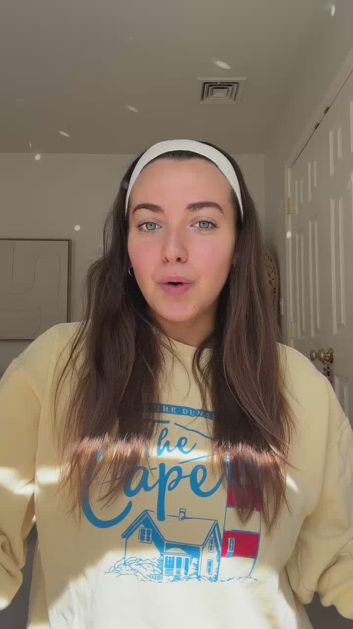 woman with brown hair in a room